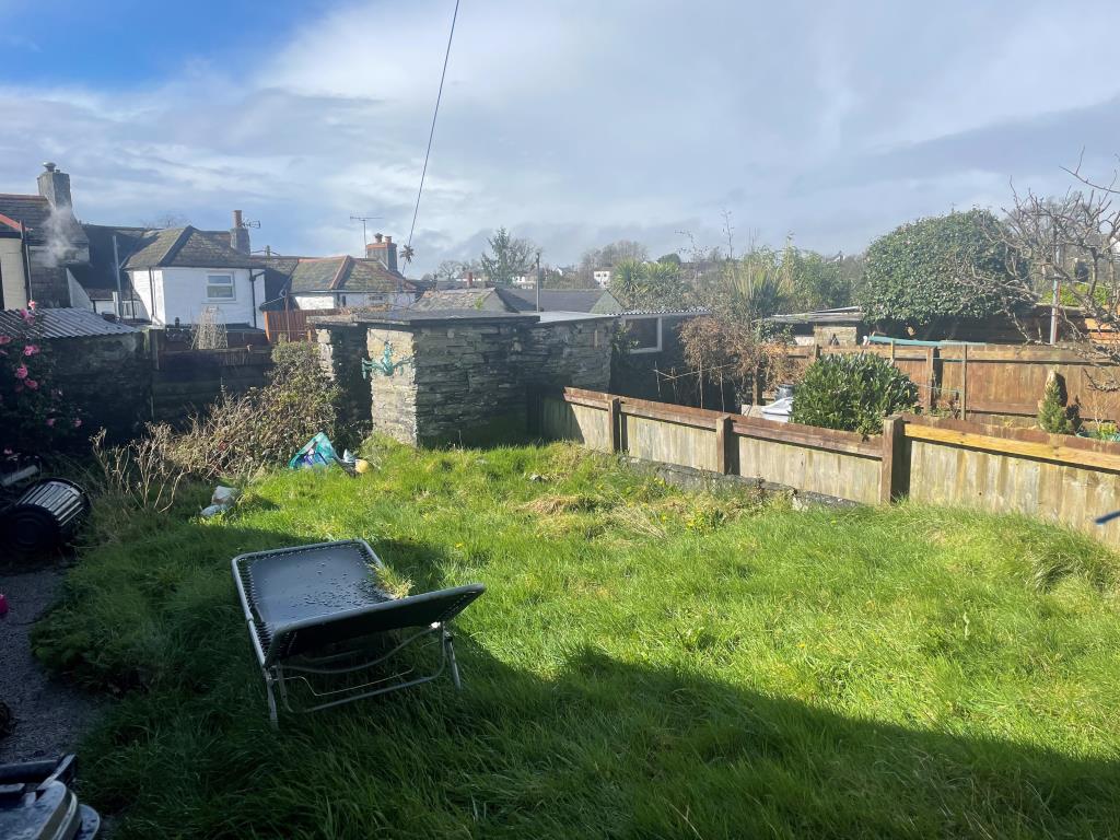 Lot: 66 - COTTAGE FOR IMPROVEMENT - Rear garden with area of grassland